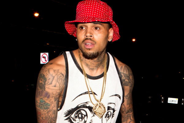 Chris brown arrested in manchester for alleged nightclub bottle attack two year old