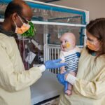 Drs musunuru and ahrens nicklas holding kj.jpg