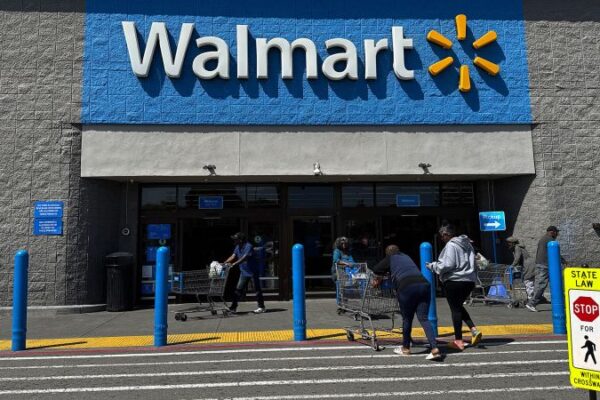 Walmart warns it will raise prices because of tariffs Gettyimages 2209422186.jpg