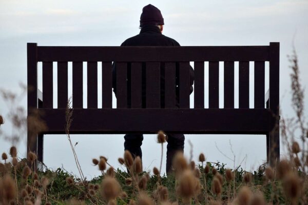 Man alone on bench stock photo 051425 5707a776f8604acda1b2b365f4340c06.jpg