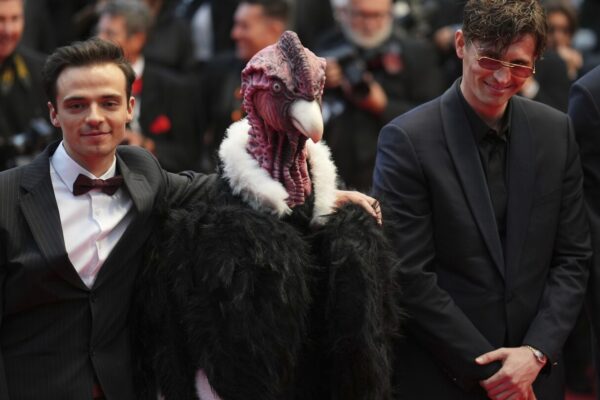 Bird man on red carpet leaves Cannes squawking Urlhttps3a2f2fassets.apnews.com2fd22f892f52450eb8c506313ad2546317b10f2ff8b86c04af4d4e65b108.jpeg