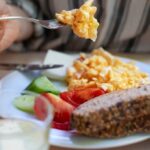 Woman eating breakfast header.jpg